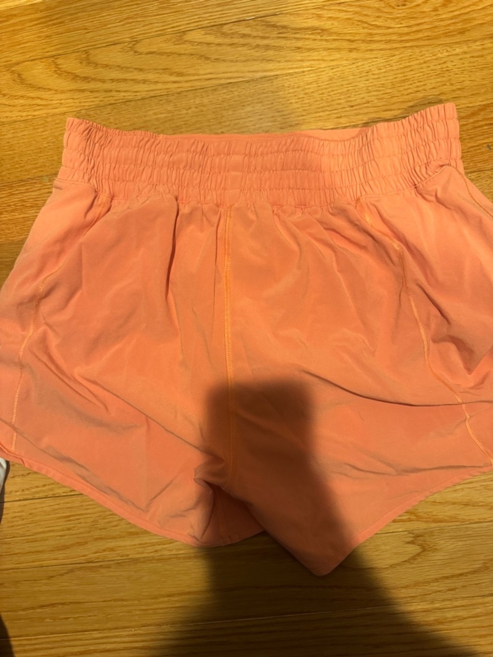 Lululemon light orange running shorts